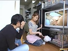 Japanese hottie watches porn and gets amazingly fucked